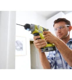 Trapano avvitatore a percussione a batteria ryobi "r18pd2-215g" 2 batterie 18v 1,5ah e caricabatterie